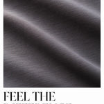 Close-up of charcoal Biome jersey folds with the headline Feel the Difference.